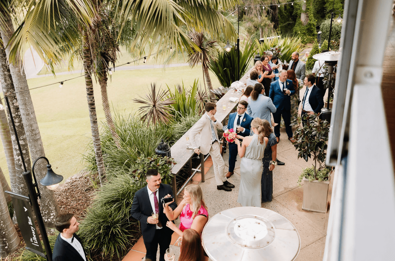 Outdoor wedding reception drinks in nature at Hillstone St Lucia, Brisbane.