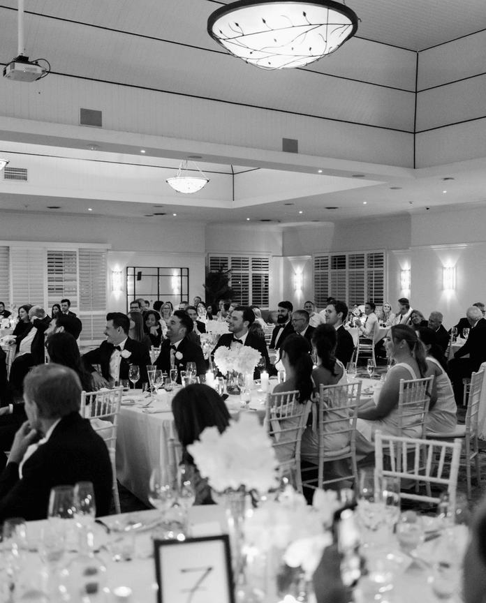 Guests seated at tables inside the Grandview Room at Hillstone St Lucia, Brisbane.