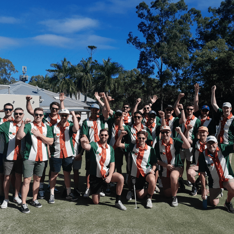 Group of men in matching shirts playing golf at St Lucia Golf Links