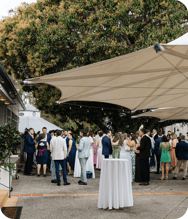 People gathered outside at a private event venue in Brisbane