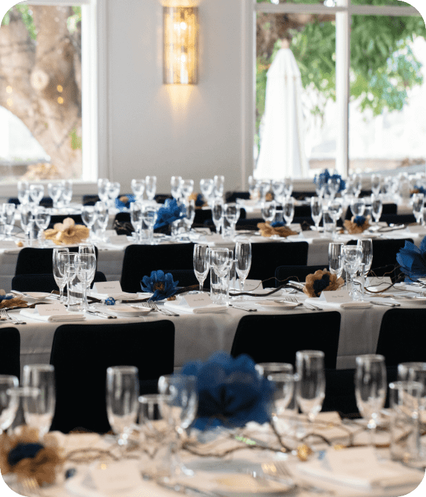 Tables and chairs lined up inside a private event venue in Brisbane